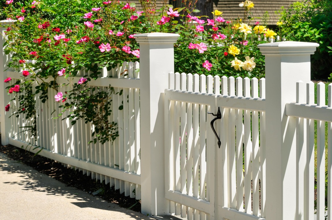 Beautiful decorative white picket fence